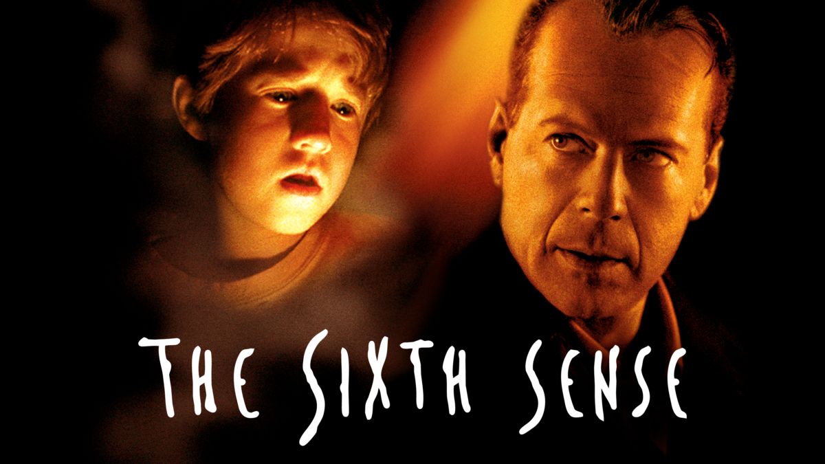 Promotional image for the movie 'The Sixth Sense' featuring a young boy with a concerned expression next to an adult man looking intensely, with warm, dramatic lighting.