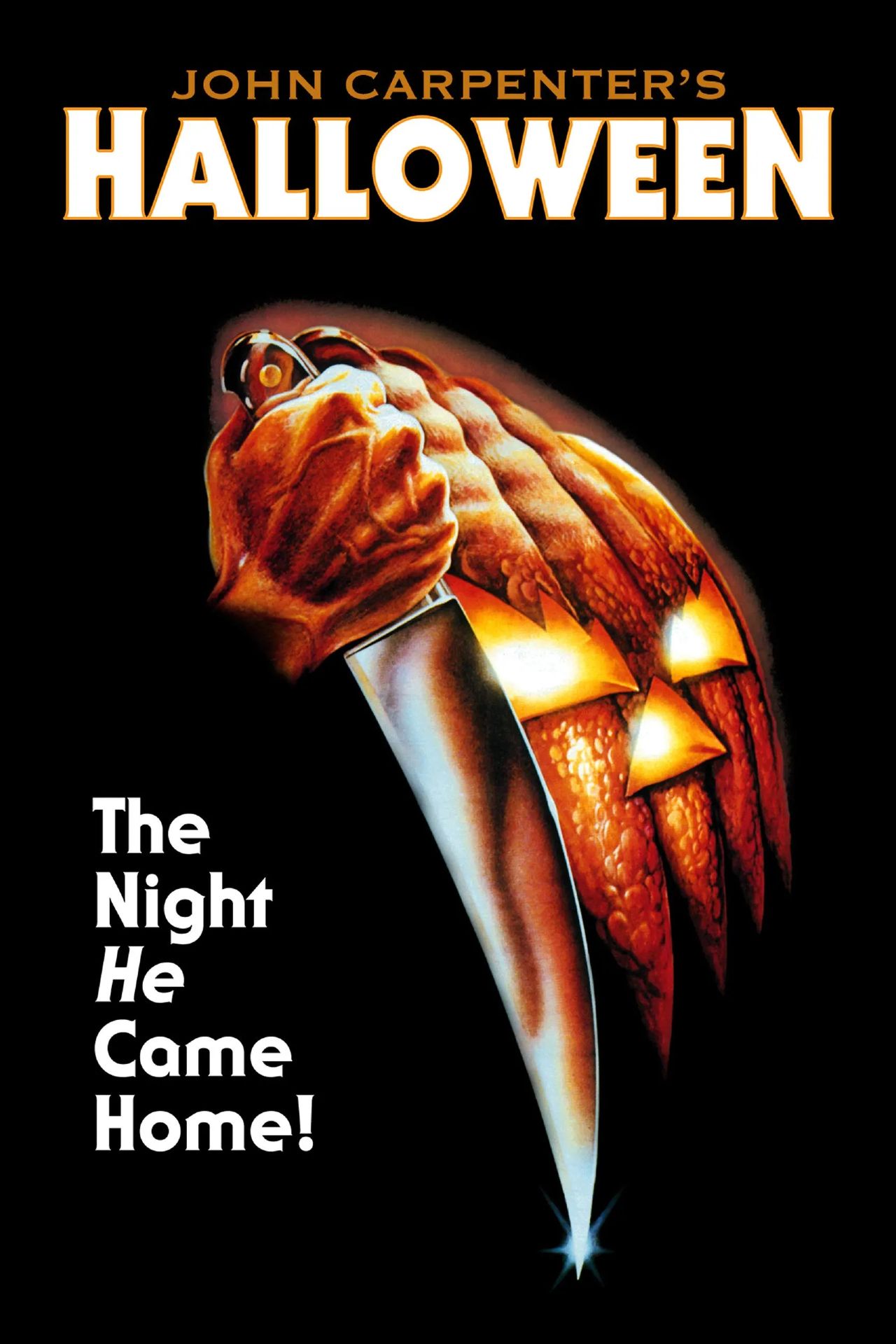 Promotional poster for John Carpenter's Halloween featuring a menacing pumpkin and a gloved hand holding a knife.