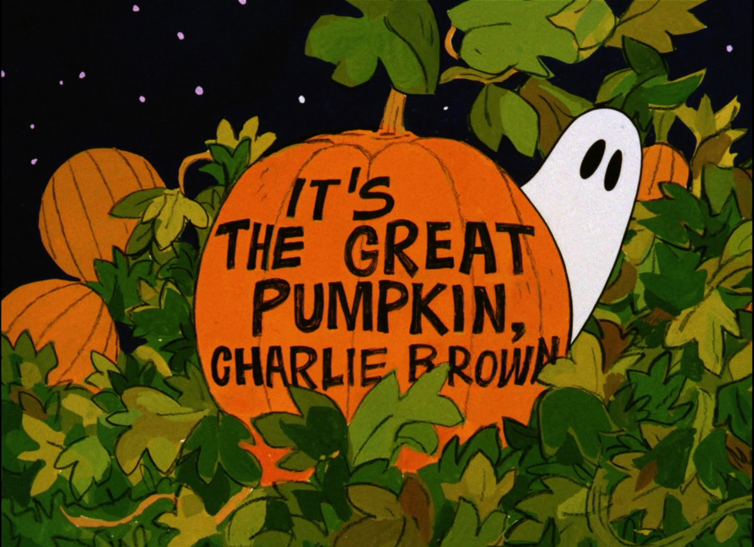 A pumpkin with the text 'It's the Great Pumpkin, Charlie Brown' surrounded by green leaves and a small white ghost.